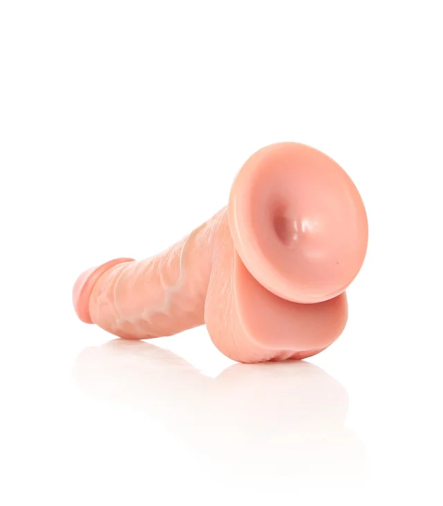 RealRock - Zakrzywione realistyczne dildo z jądrami i przyssawką 15,5 cm