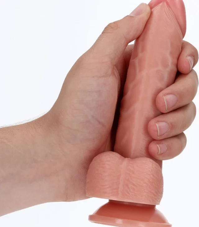 RealRock - Zakrzywione realistyczne dildo z jądrami i przyssawką 15,5 cm